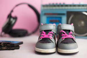 this composition pays homage to the legendary 80s through some typical of that era objects